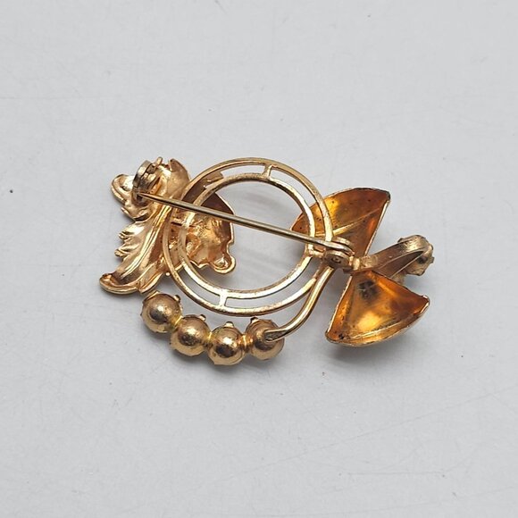 Vintage Gold Tone Brooch With Blue Clear Rhinestones Bow Leaf Design - Picture 3 of 4